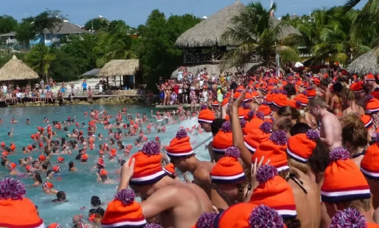 Comunidad holandesa en Cancún trae su cultura, se sumergirá en agua con hielo